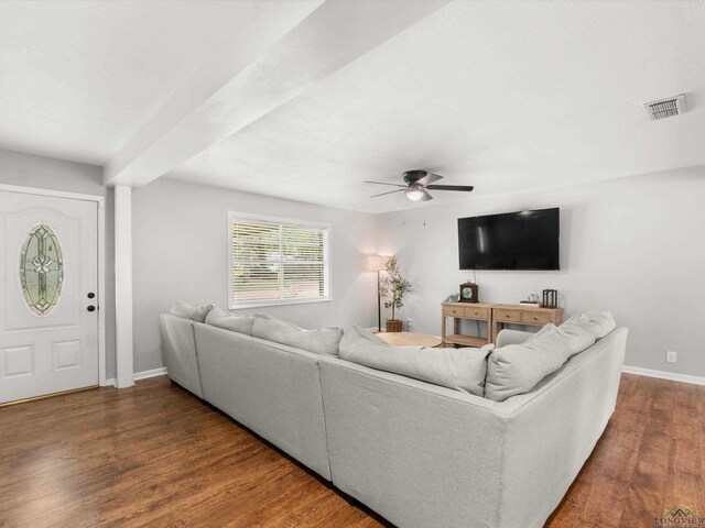 514 N St, Gilmer, TX 75644 - living room featuring ceiling fan and wood finished floors