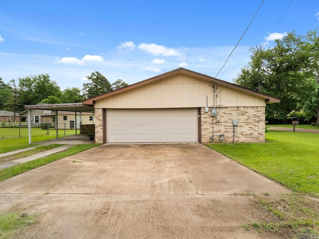 514 N St, Gilmer, TX 75644 - view of front of property featuring brick siding, a front yard, and a garage