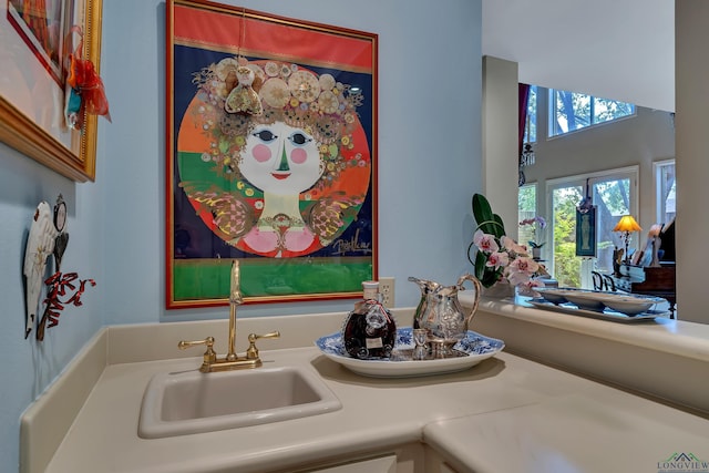 bathroom featuring french doors and vanity