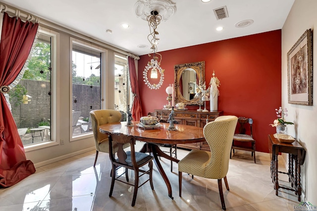 dining room featuring light tile patterned floors