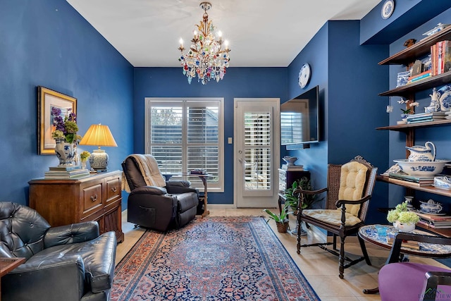 living area with light tile patterned flooring and an inviting chandelier