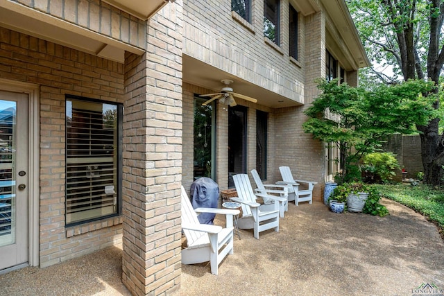 view of patio / terrace featuring ceiling fan