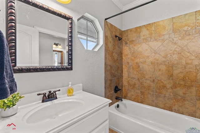full bathroom with crown molding, bathtub / shower combination, vanity, and a textured wall
