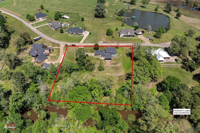 bird's eye view featuring a residential view and a water view