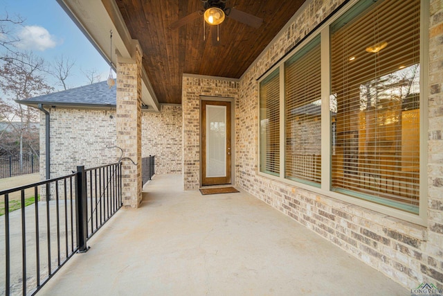 view of patio featuring ceiling fan