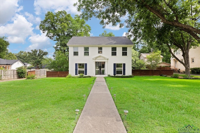 513 E Young, Longview, TX 75602 - colonial home featuring stucco siding