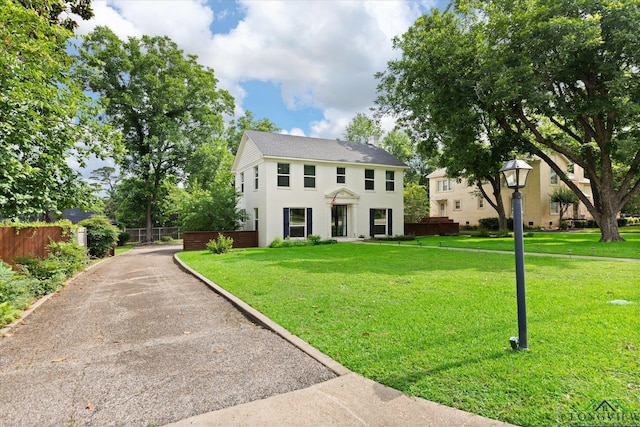 513 E Young, Longview, TX 75602 - colonial inspired home featuring stucco siding