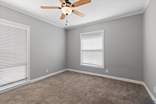 513 E Young, Longview, TX 75602 - carpeted spare room featuring baseboards, ornamental molding, and a ceiling fan