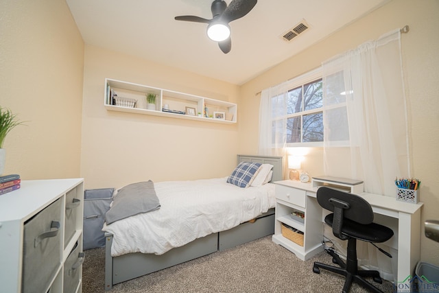 bedroom featuring carpet floors, visible vents, and ceiling fan