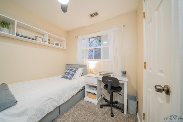 bedroom with carpet floors and visible vents