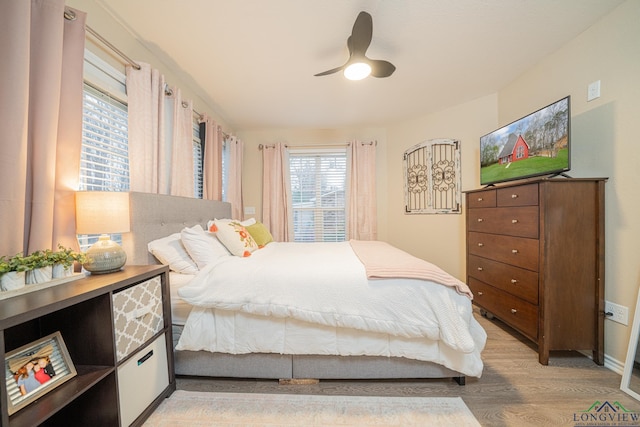 bedroom featuring ceiling fan and light wood-style floors