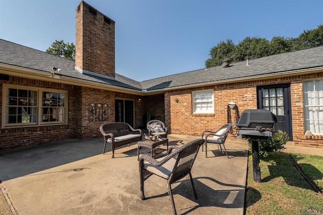 view of patio / terrace with an outdoor hangout area and grilling area