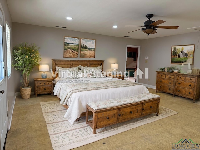 bedroom featuring multiple windows and ceiling fan