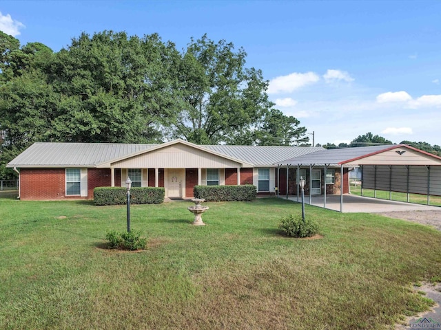 ranch-style home with a carport and a front lawn