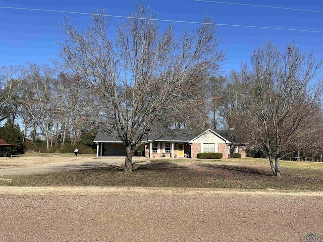 ranch-style house featuring a garage