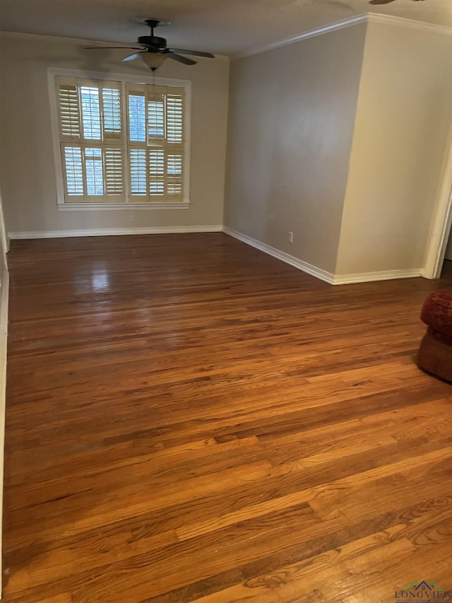 empty room with ceiling fan, ornamental molding, and hardwood / wood-style flooring