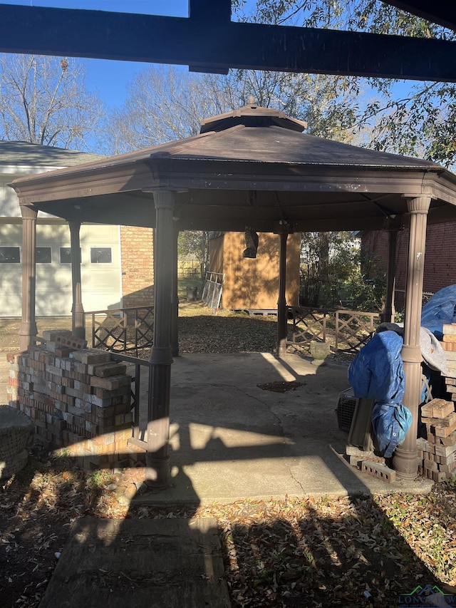 view of parking / parking lot with a gazebo