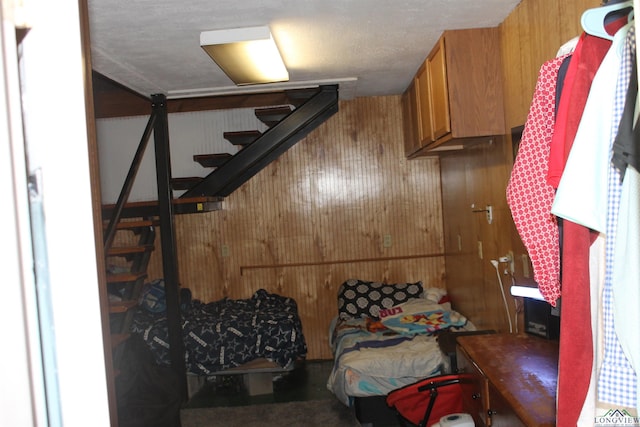 interior space featuring wood walls