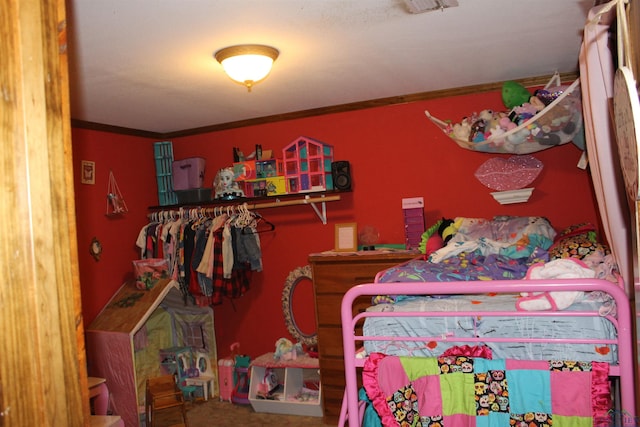 bedroom with crown molding