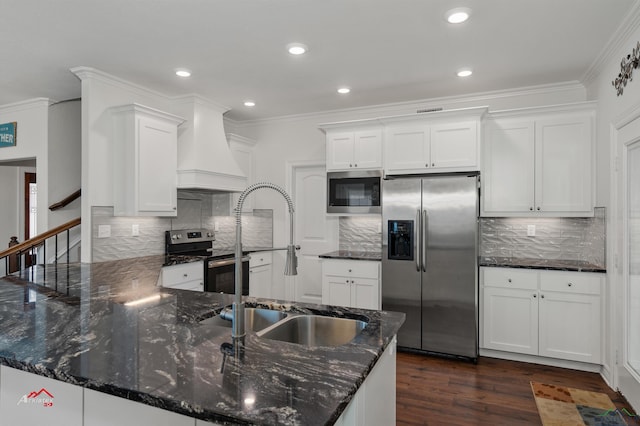 kitchen with white cabinets, kitchen peninsula, stainless steel appliances, and premium range hood