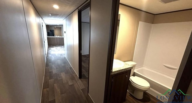 hallway with dark wood-type flooring