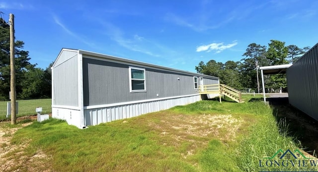 view of home's exterior featuring a yard