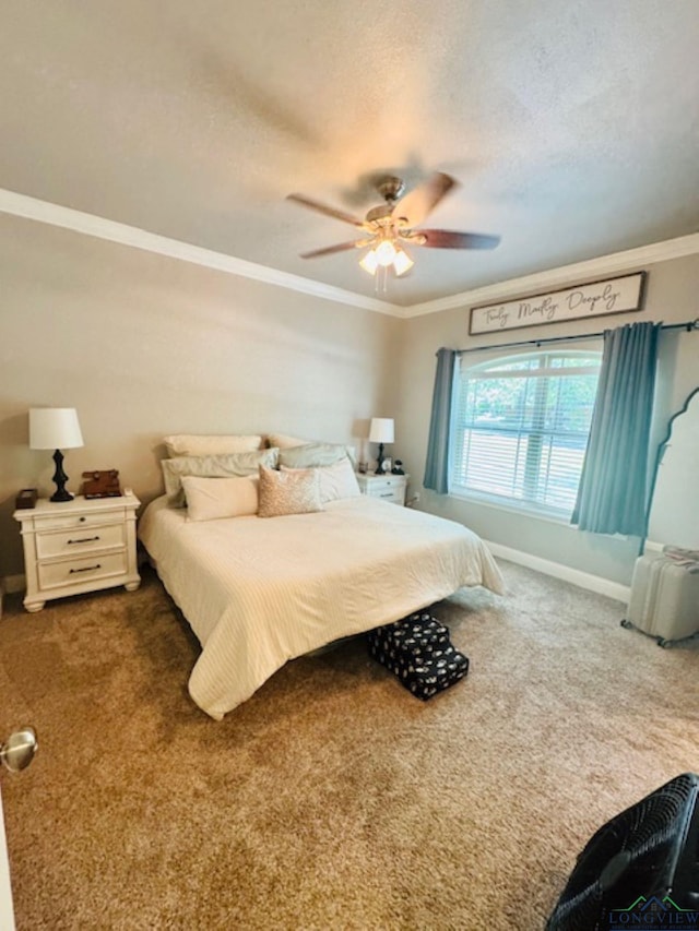 bedroom with baseboards, radiator, carpet flooring, ornamental molding, and ceiling fan