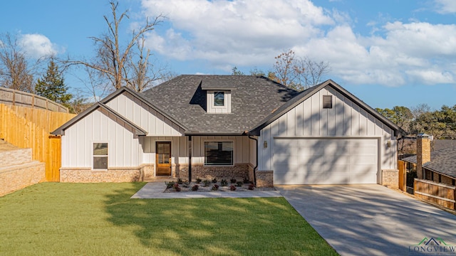 modern farmhouse style home featuring a garage and a front lawn