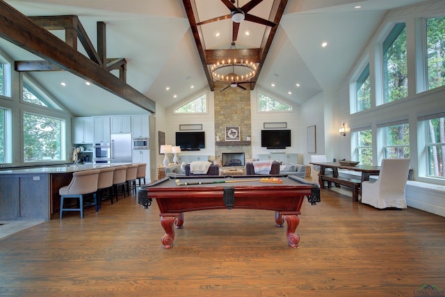 688 E Eagle Point Dr, Mount Vernon, TX 75457 - rec room with high vaulted ceiling, a chandelier, dark wood-style floors, billiards table, and healthy amount of natural light