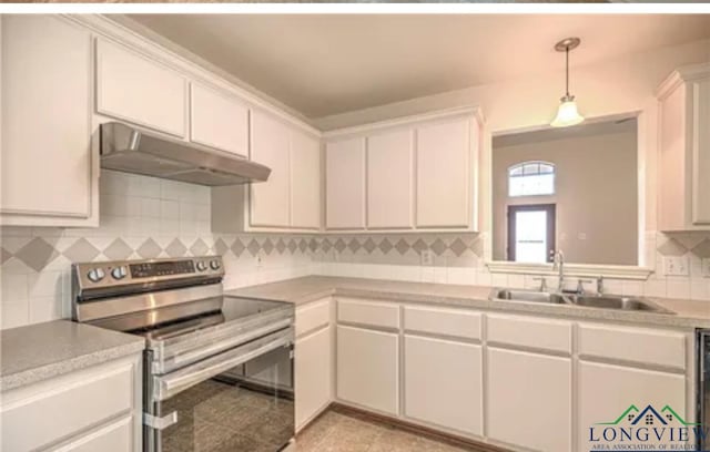 kitchen with sink, backsplash, electric range, white cabinets, and decorative light fixtures