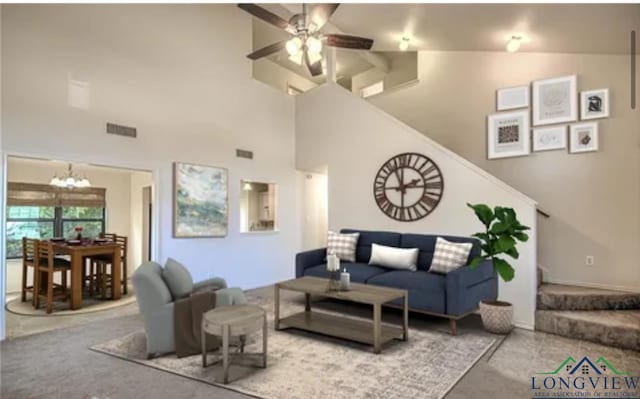 living room with ceiling fan with notable chandelier and high vaulted ceiling