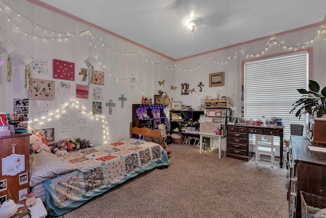 bedroom with crown molding and carpet flooring