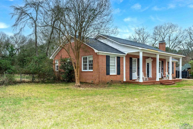 exterior space featuring a porch and a front lawn