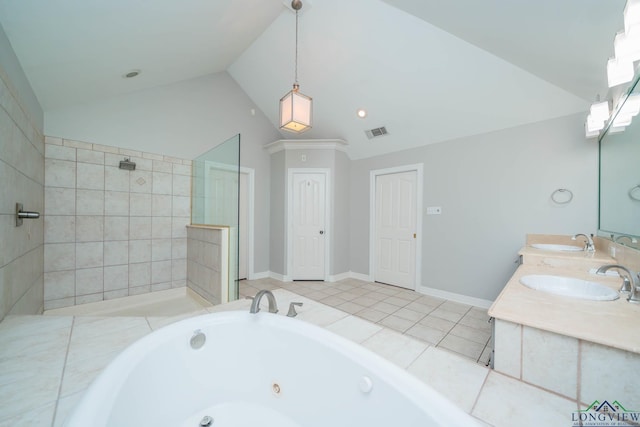 bathroom with visible vents, a sink, a whirlpool tub, and lofted ceiling