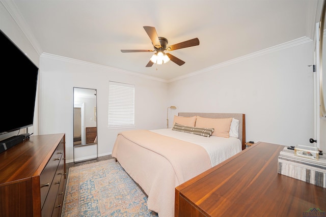523 Molly Cir, Carthage, TX 75633 - bedroom featuring crown molding and a ceiling fan
