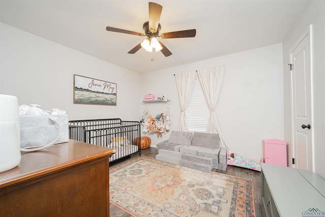 523 Molly Cir, Carthage, TX 75633 - bedroom with wood finished floors and a ceiling fan