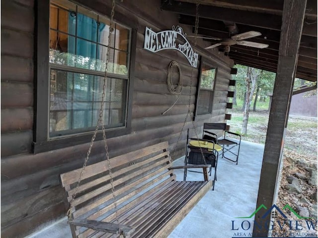 view of patio with ceiling fan