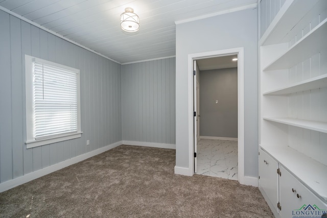 unfurnished bedroom featuring light carpet