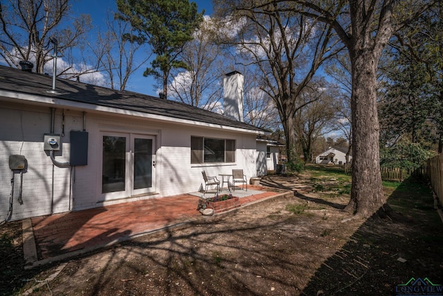 rear view of property with a patio