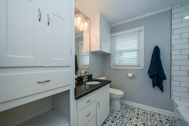 bathroom featuring crown molding, vanity, and toilet