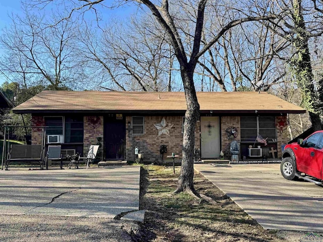 view of front of property featuring cooling unit