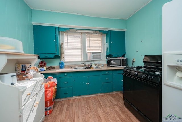 kitchen with crown molding, light hardwood / wood-style floors, black gas stove, and sink