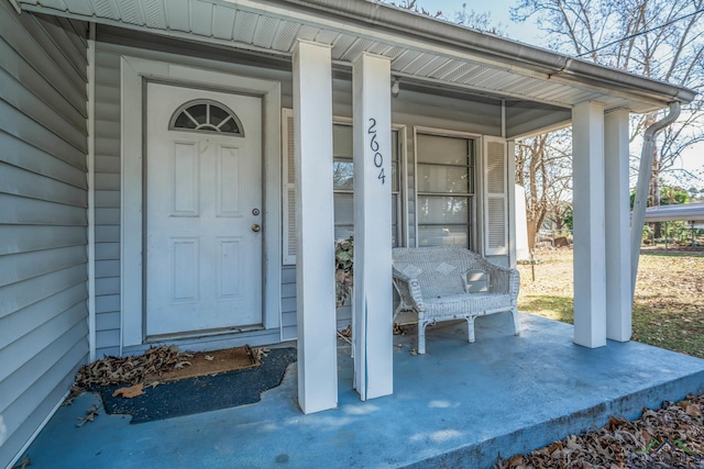 doorway to property featuring a porch