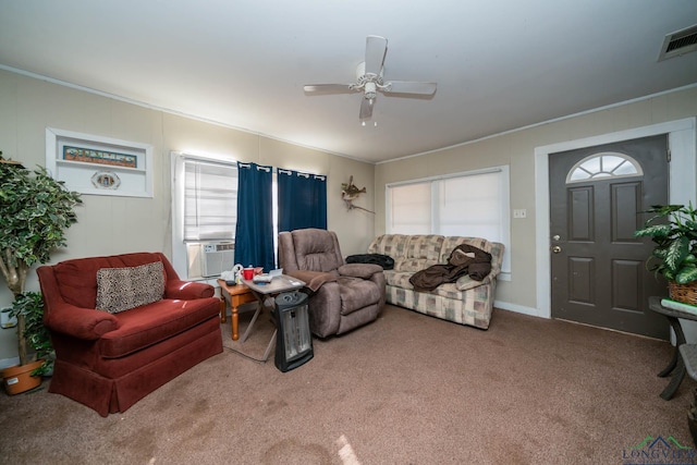 carpeted living room featuring cooling unit, ceiling fan, and plenty of natural light