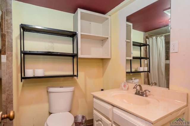 204 E Avalon Ave, Longview, TX 75602 - bathroom with toilet, a shower with shower curtain, and vanity