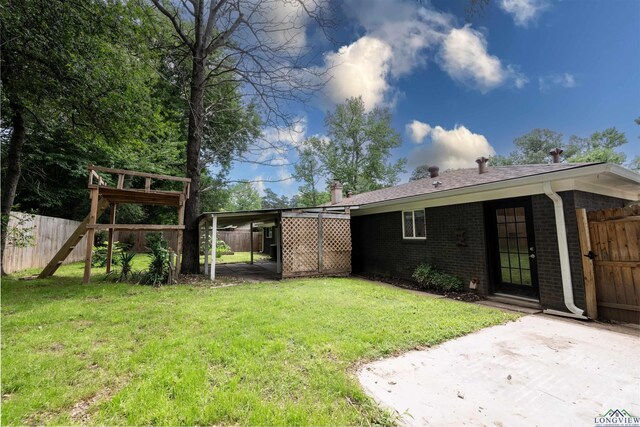 1005 Coushatta Trl, Longview, TX 75605 - view of yard with a carport