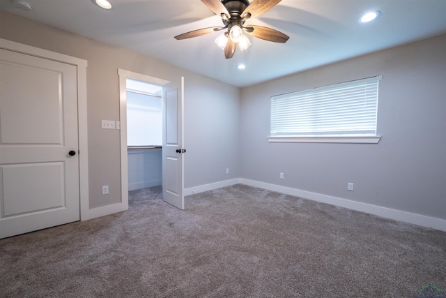 1005 Coushatta Trl, Longview, TX 75605 - unfurnished bedroom with carpet floors, baseboards, recessed lighting, ceiling fan, and a closet