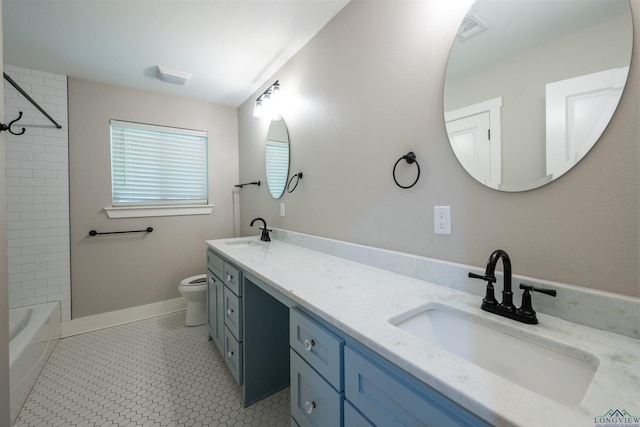 1005 Coushatta Trl, Longview, TX 75605 - bathroom with toilet, double vanity, shower / tub combination, and baseboards