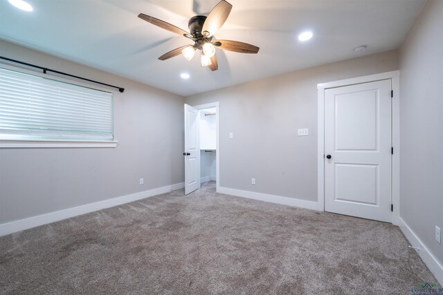 1005 Coushatta Trl, Longview, TX 75605 - unfurnished bedroom with carpet floors, recessed lighting, baseboards, and a ceiling fan