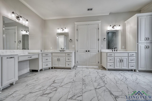 bathroom with vanity and ornamental molding